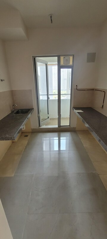 Kitchen in 2 BHK Apartment at Piramal Vaikunth, Balkum Pada – for Rent