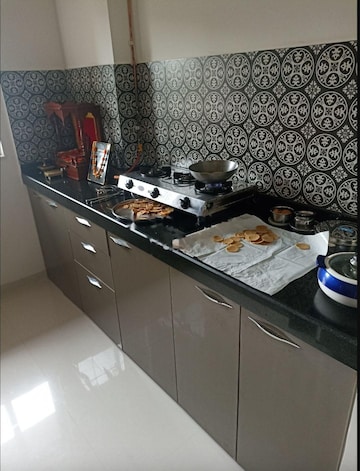 Kitchen in 1 BHK Apartment at Lodha Amara, Kolshet Road – for Rent