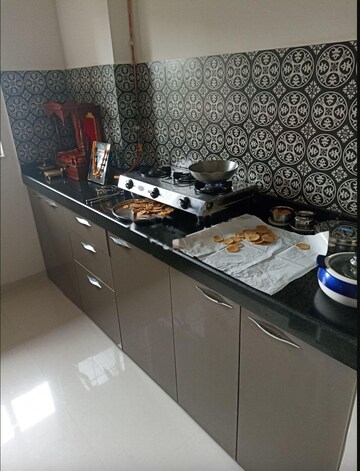 Kitchen in 1 BHK Apartment at Lodha Amara, Kolshet Road – for Rent
