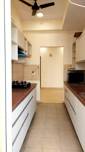 Kitchen in 3 BHK Apartment at Mahagun Moderne Low Rise, Sector 78 – for Sale