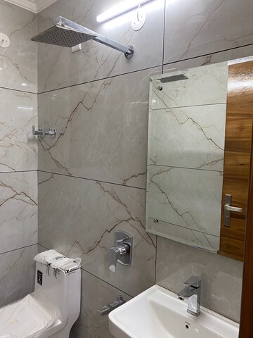Bathroom in 3 BHK Builder Floor at Vasant Enclave – for Sale
