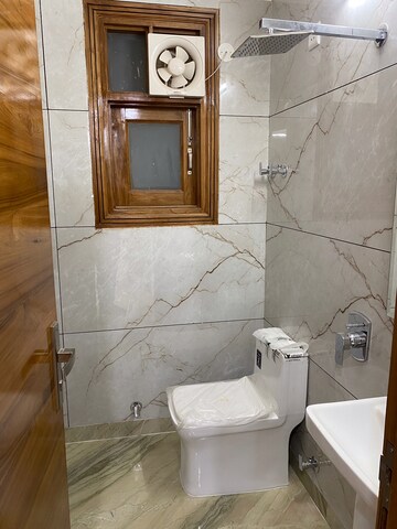 Bathroom in 3 BHK Builder Floor at Vasant Enclave – for Sale