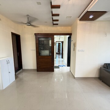 Living Room in 3 BHK Apartment at Rustomjee Athena, Vrindavan Society – for Sale
