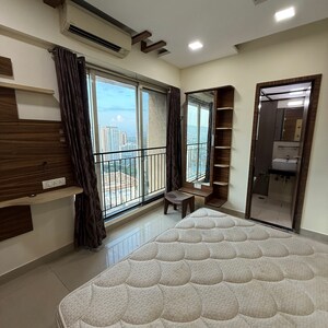 Master Bedroom in 3 BHK Apartment at Rustomjee Athena, Vrindavan Society – for Sale