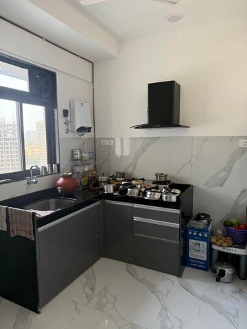 Kitchen in 2 BHK Apartment at Dev Leo Tower, Oshiwara – for Rent