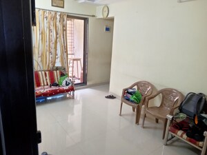 Living Room in 1 BHK Apartment at Gami  Amar Harmony, Taloja – for Sale