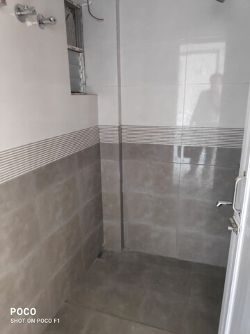 Bathroom in 2 BHK Apartment at Merlin Oikyo, Baruipur – for Sale