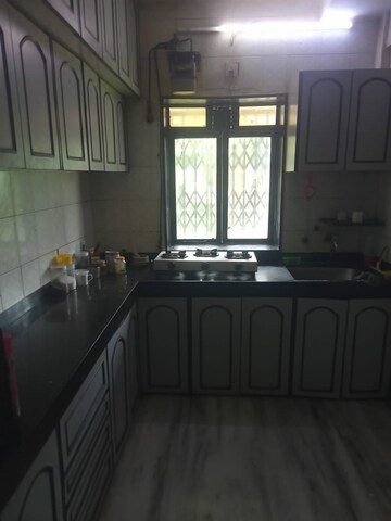 Kitchen in 2 BHK Apartment at Rohit Complex, Andheri West – for Rent