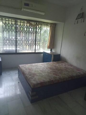 Bedroom in 2 BHK Apartment at Rohit Complex, Andheri West – for Rent