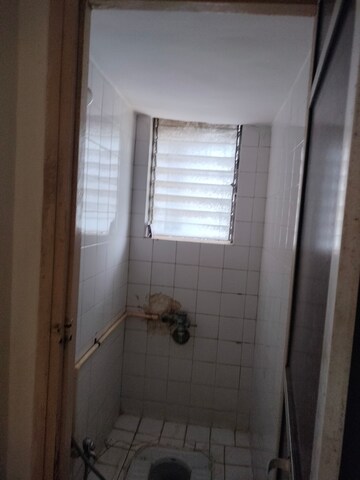 Bathroom in 1 BHK Apartment at River Park Complex, Dahisar East – for Rent