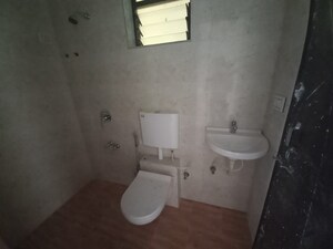Bathroom in 2 BHK Apartment at Ojass Mai Kripa CHS, Louis Wadi – for Sale