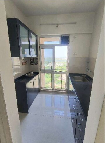 Kitchen in 1 BHK Apartment at Vijay Orovia, Ghodbunder Road – for Rent