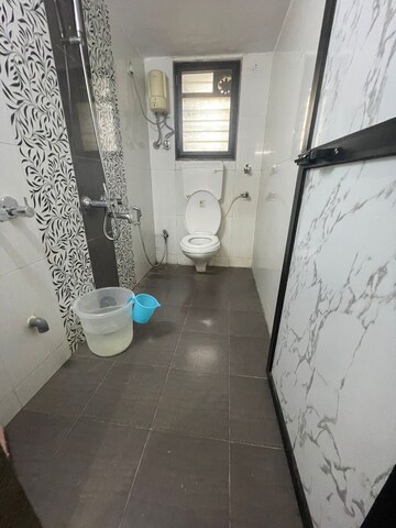 Bathroom in 2 BHK Apartment at Swarna Apartments, Mira Road – for Rent