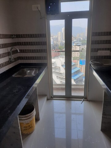Kitchen in 2 BHK Apartment at JVM Corner Stone, Naupada – for Sale