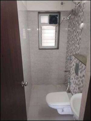 Bathroom in 1 BHK Apartment at Wadhwa Elite Solitaire, Kolshet Road – for Sale