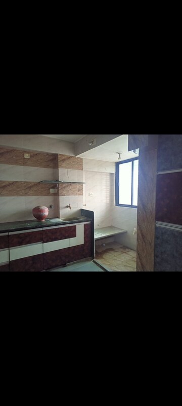 Kitchen in 2 BHK Apartment at Roots Aarav Arise, Vastrapur – for Rent