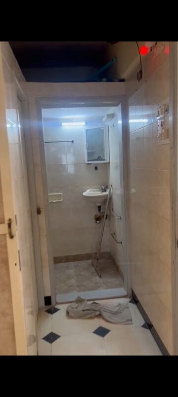 Bathroom in 1 BHK Apartment at Kanchan Ganga Apartment, Andheri West – for Rent