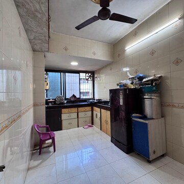 Kitchen in 2 BHK Apartment at Vasai West – for Sale