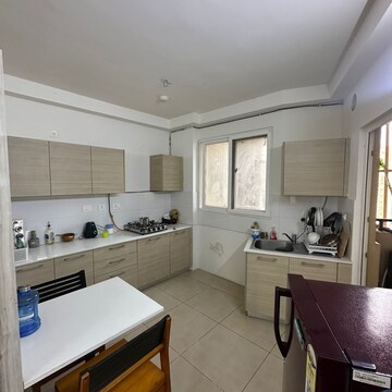 Kitchen in 1 BHK Apartment at Bhartiya City Nikoo Homes II, Kannur – for Rent