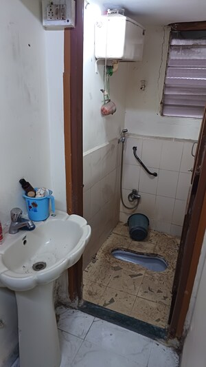 Bathroom in 1 RK Apartment at Rasta Peth – for Sale