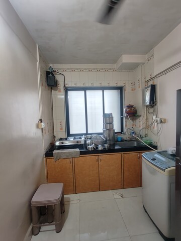 Kitchen in 1 BHK Apartment at Vijay Tower CHS, Naupada – for Rent