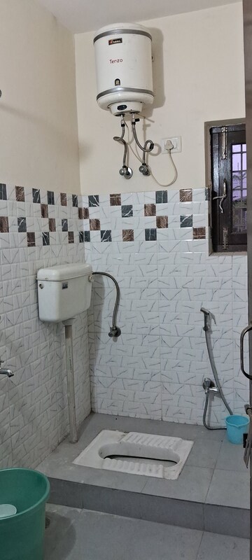 Bathroom in 2.5 BHK Apartment at Sarita Vihar – for Rent