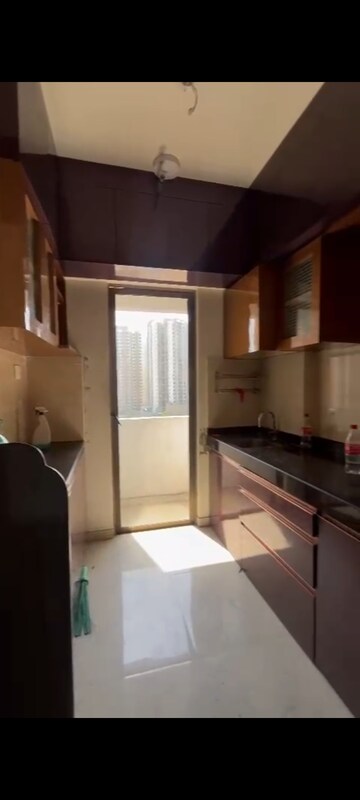 Kitchen in 2 BHK Apartment at Sunteck West World, Naigaon East – for Rent