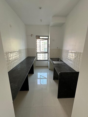 Kitchen in 2 BHK Apartment at Kalpataru Paramount, Kapur Bawdi – for Rent
