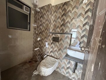 Bathroom in 1 BHK Apartment at Veena Smart Homes, Kandivali West – for Rent