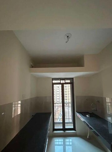 Kitchen in 2 BHK Apartment at Rustomjee Avenue L1, Virar West – for Rent