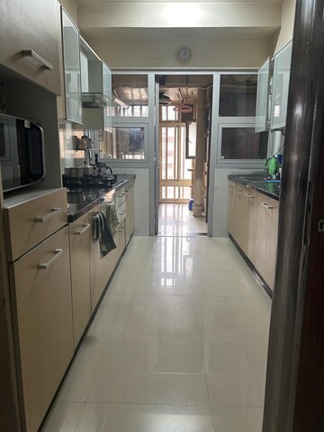 Kitchen in 3 BHK Apartment at DB Realty Orchid Woods, Goregaon East – for Rent