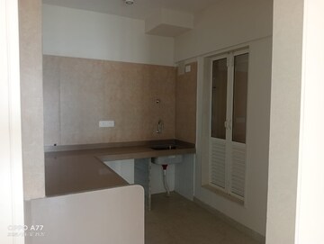 Kitchen in 1.5 BHK Apartment at Dosti West County, Balkum Pada – for Rent