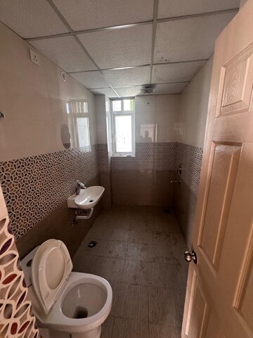 Bathroom in 3 BHK Apartment at Chandra Modern Panorama, Bagiamau – for Rent