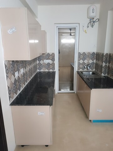Kitchen in 2.5 BHK Builder Floor at Signature Global Park 4 and 5, Sohna Sector 36 – for Rent