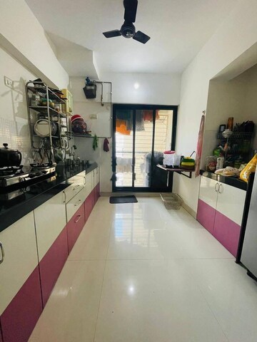 Kitchen in 2 BHK Apartment at Dosti West County, Balkum Pada – for Rent