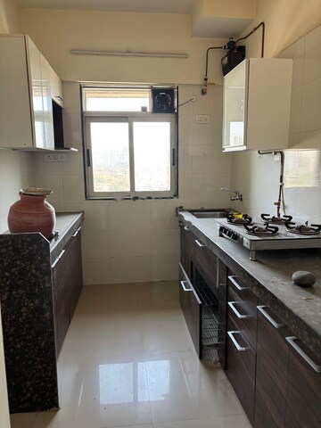 Kitchen in 2 BHK Apartment at Vihang Hills, Ghodbunder Road – for Rent