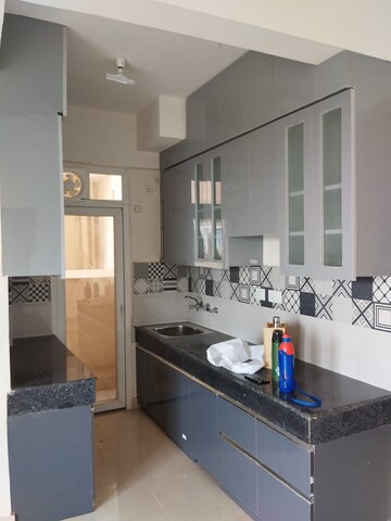 Kitchen in 2 BHK Apartment at Signature The Serenas, Sohna Sector 36 – for Rent