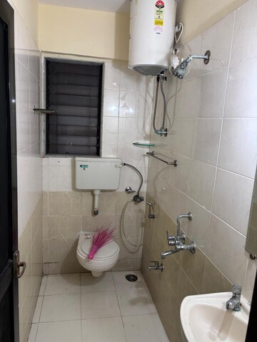 Bathroom in 2 BHK Apartment at Sai Nagar CHS Andheri West, Andheri West – for Rent