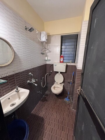 Bathroom in 2 BHK Apartment at Sai Nagar CHS Andheri West, Andheri West – for Rent