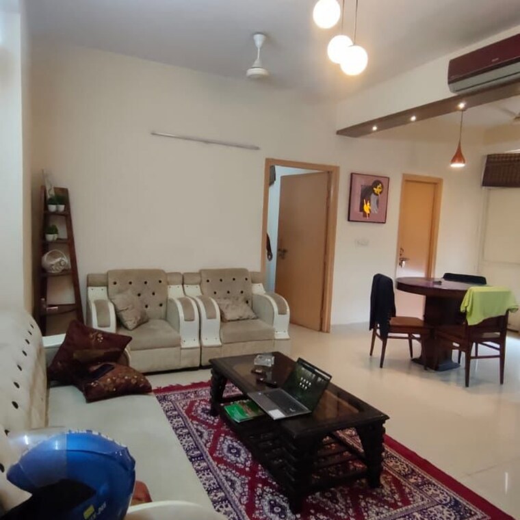 Living Room, go-giriraj 2 Bedroom 800 Sq.Ft. Apartment In Sukarwadi Mumbai 8663054