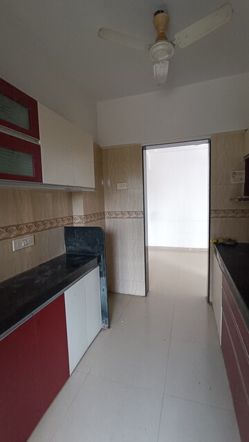Kitchen in 3 BHK Apartment at Romell Empress, Borivali West – for Rent