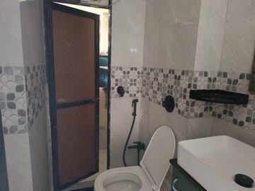 Bathroom in 3 BHK Apartment at Romell Empress, Borivali West – for Rent