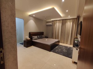 Living Room in 4 BHK Apartment at Maya Green Lotus Utsav, International Airport Road – for Sale