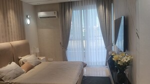 Living Room in 4 BHK Apartment at Maya Green Lotus Utsav, International Airport Road – for Sale