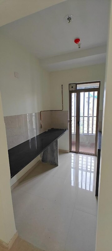 Kitchen in 2 BHK Apartment at Kalpataru Paramount, Kapur Bawdi – for Rent