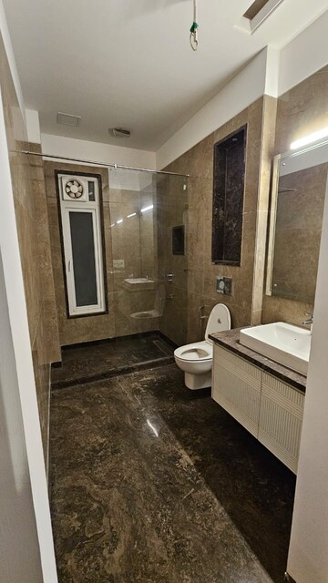 Bathroom in 4 BHK Apartment at Green Park – for Rent