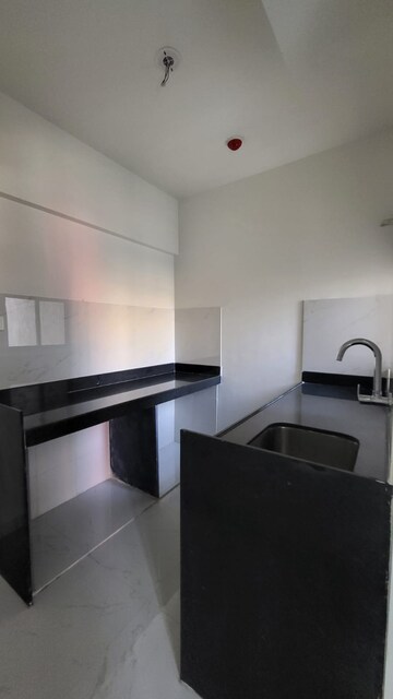 Kitchen in 1 BHK Apartment at Runwal Gardens, Dombivli East – for Rent