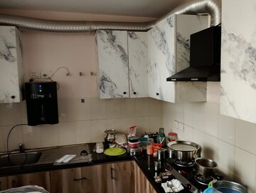 Kitchen in 1 BHK Apartment at Unitech Uniworld Resorts-The Residences, Sector 33 – for Rent