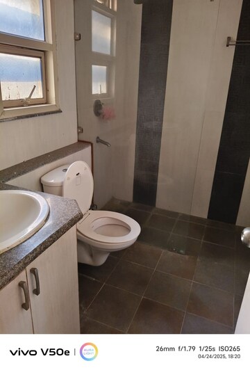 Bathroom in 1 BHK Apartment at Unitech Uniworld Resorts-The Residences, Sector 33 – for Rent
