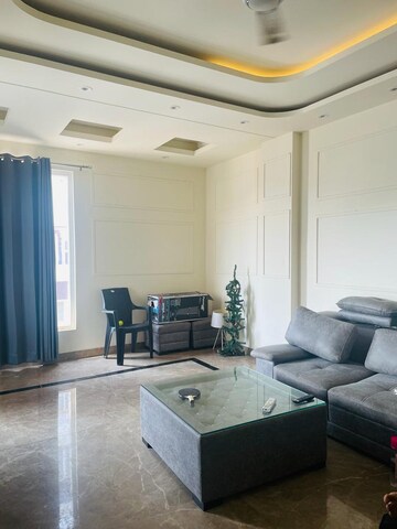 Living Room in 4 BHK Apartment at Ardee City, Sector 52 – for Rent